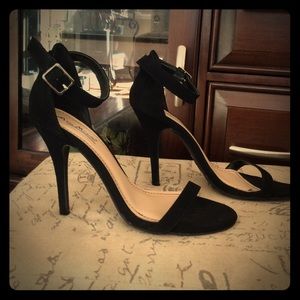 Black heeled strappy sandals