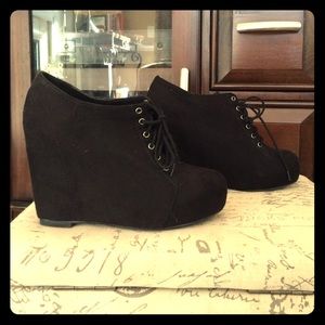 Black wedge lace-ups