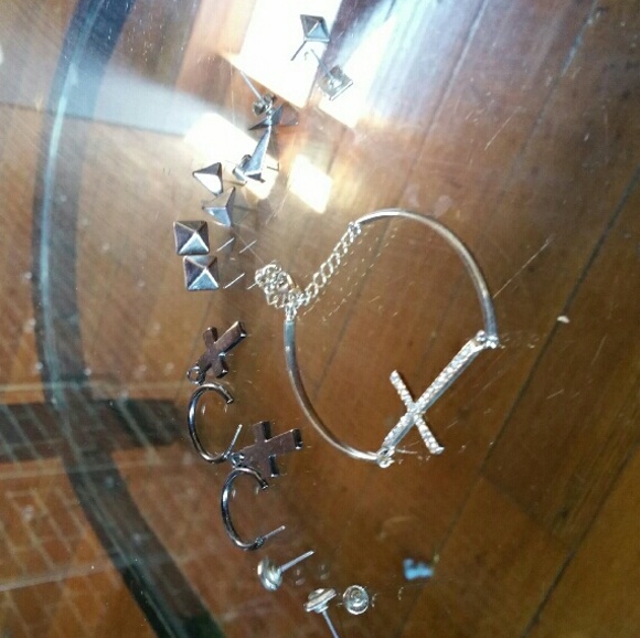 assorted geometric silver jewelry