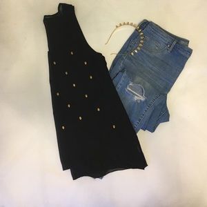 Black top with gold skulls