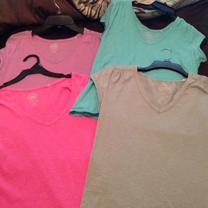 Four XL v neck bright colored t shirts