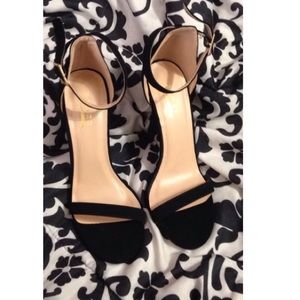 High heels. Worn once for less than an hour.