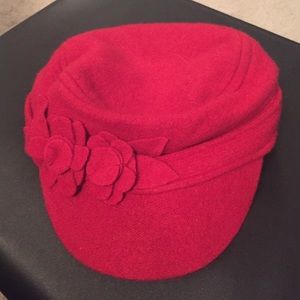 Red wool hat with cute flower decoration