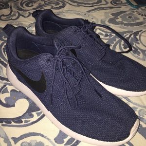 Navy and black nike roshes