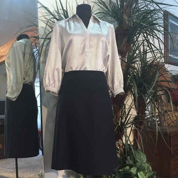 Silky polka dot blouse.