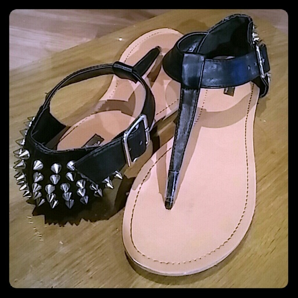 Black studded thong sandles.