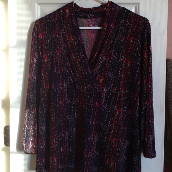 3/4 length sleeved deep v-neck top.