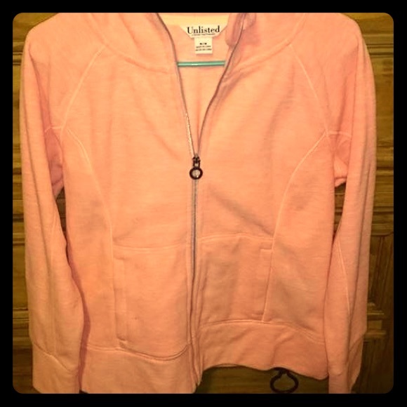 Light pink/coral jacket.