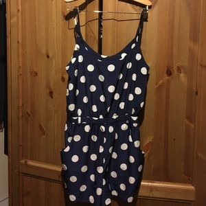 Blue romper with white polka dots