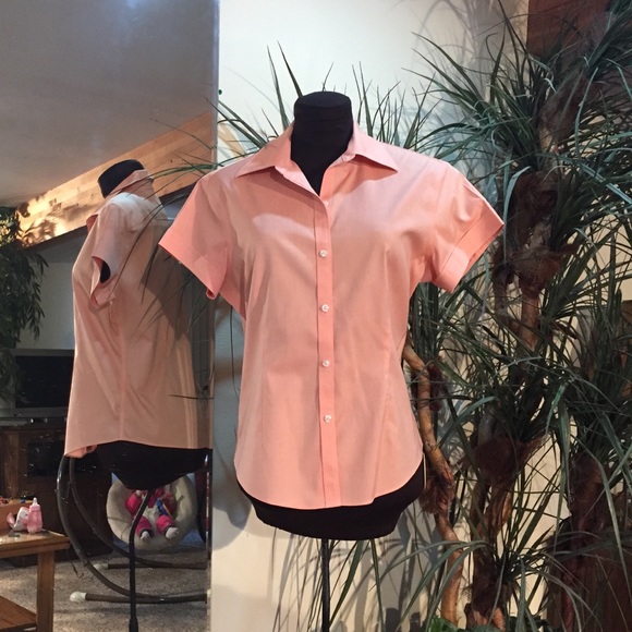 Peach short sleeved button down.