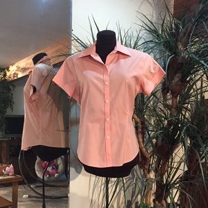 Peach short sleeved button down.