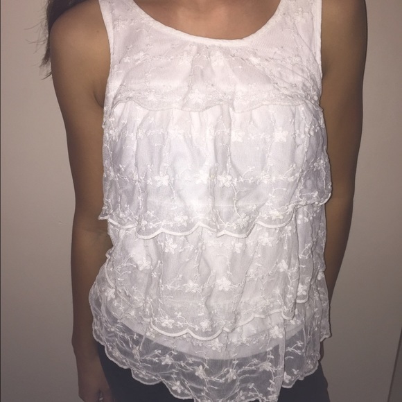 White ruffled blouse