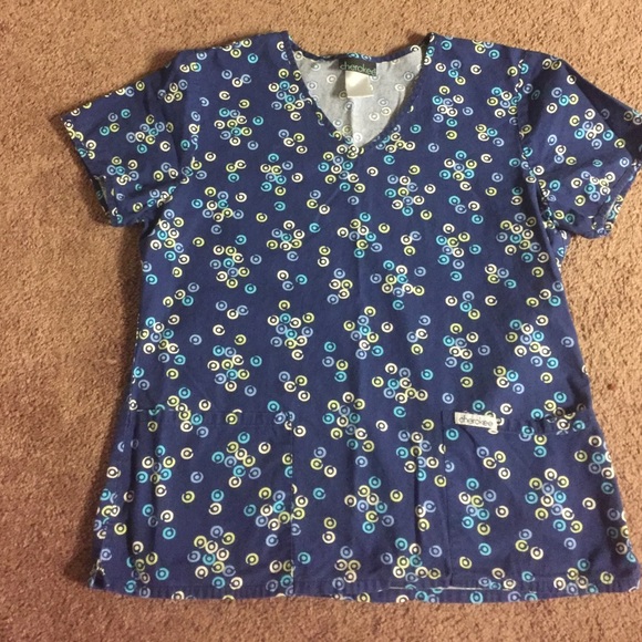 Navy blue patterned scrub top