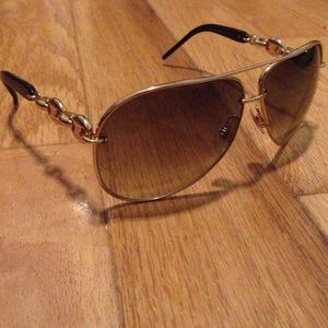 Gucci sunglasses model number GG 4225/S