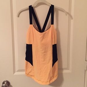 Yellow and black Lulu Lemon workout top