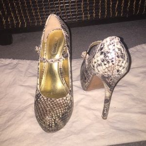 Wild Pair snake skin pumps