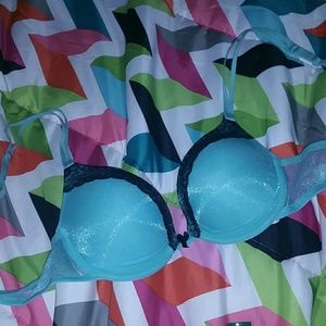 Shiny blue bra with black lace push up