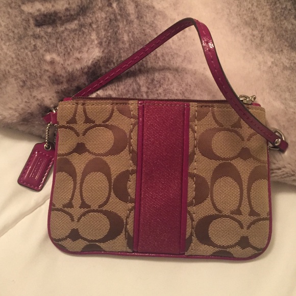 Authentic Coach wristlet.