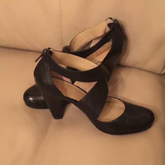 Black Levity pump with back heel zipper.