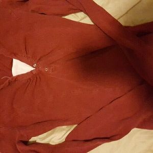Reddish/rust color top