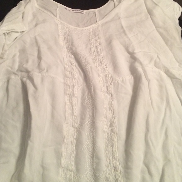 Women's cream colored shirt