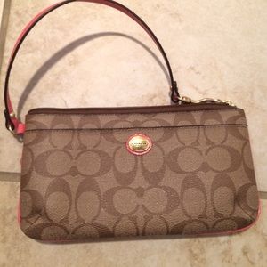 coach brown/coral wristlet