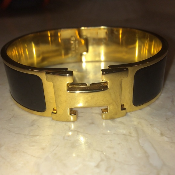 Hermes Jewelry - Black and gold Hermès bracelet