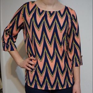Coral and navy patterned blouse