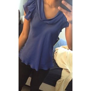 Royal blue silk blouse.