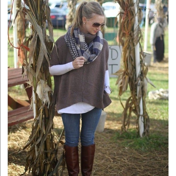 Brown poncho sweater.