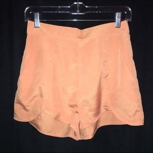 silky orange flowy shorts