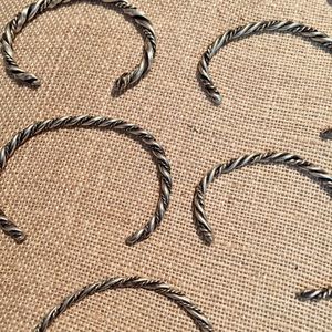Sterling vintage Native American twist rope cuffs