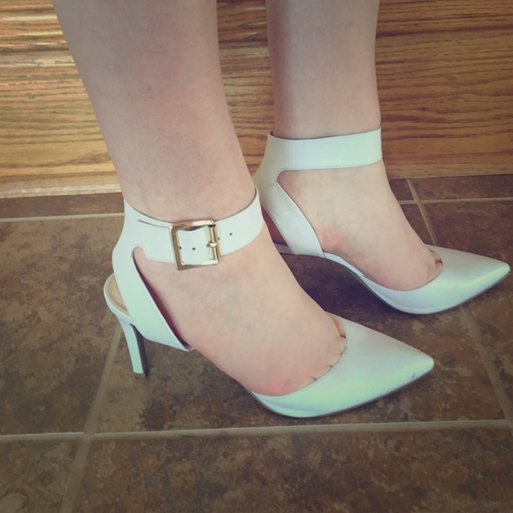 White, pointy toed heels