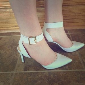 White, pointy toed heels