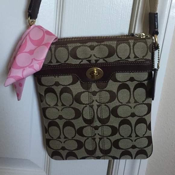Coach cross body with pink ribbon