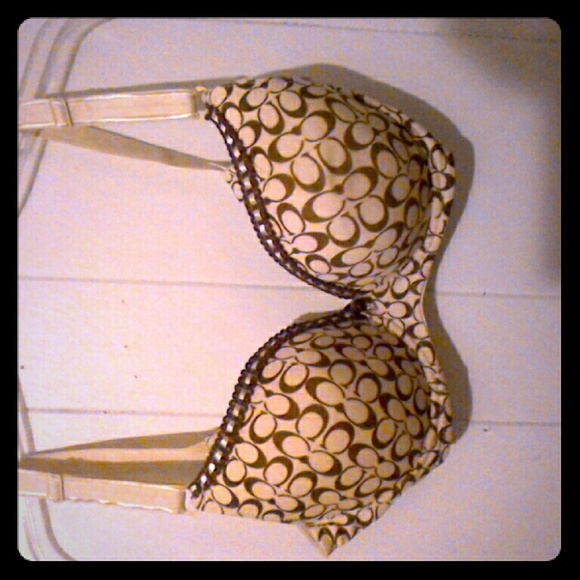 A Coach bra in nude and tan