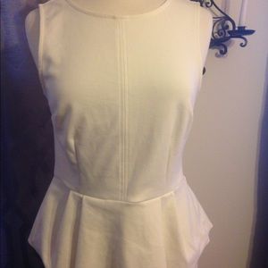 Elle peplum top.  Cream size 10 (M)