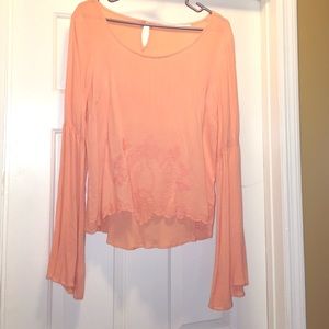 Boutique top flared sleeves