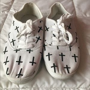 Slightly used, white and black cross shoes