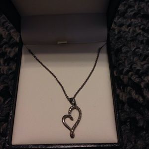 Sold!! Pretty silver heart necklace from littmans