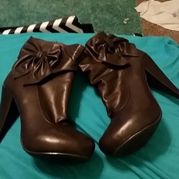 High heel booties. Never worn!!!!!