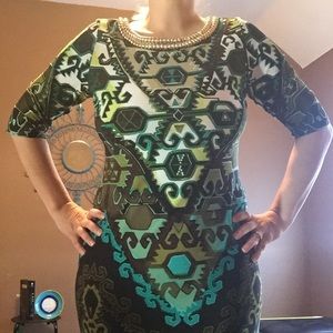 Dress- just below the knees