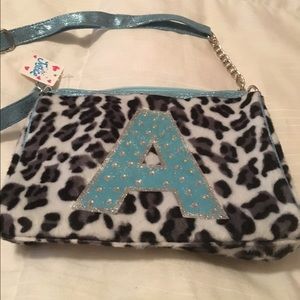 Justice handbag never used