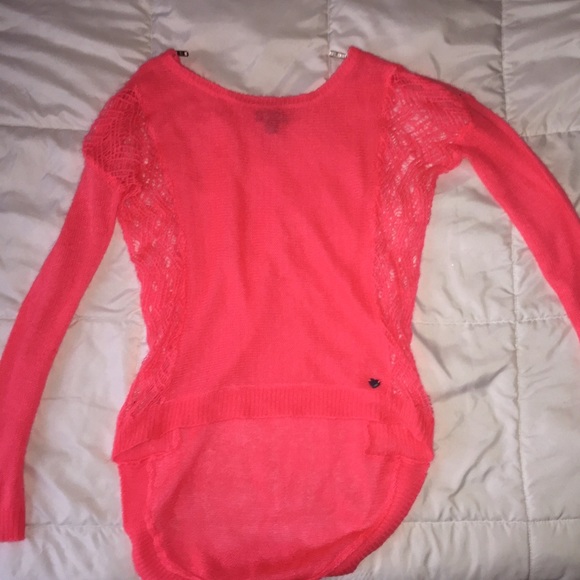 Fluorescent coral sweater with zipper shoulder
