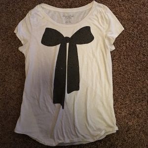 Soft tee with black bow on front