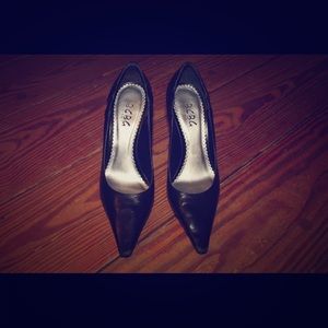 BCBG Paris black leather pumps