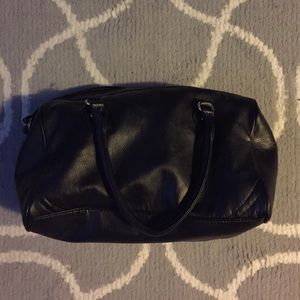 Small duffle like, simple black bag.