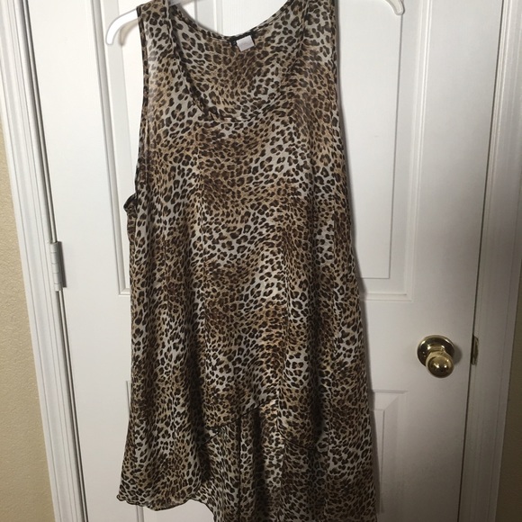 Animal print sheer hi-lo top. Racer back style.