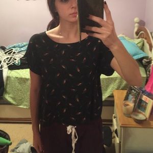 Black t shirt with feather design