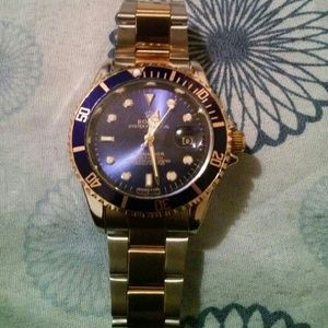 Blue and gold watch